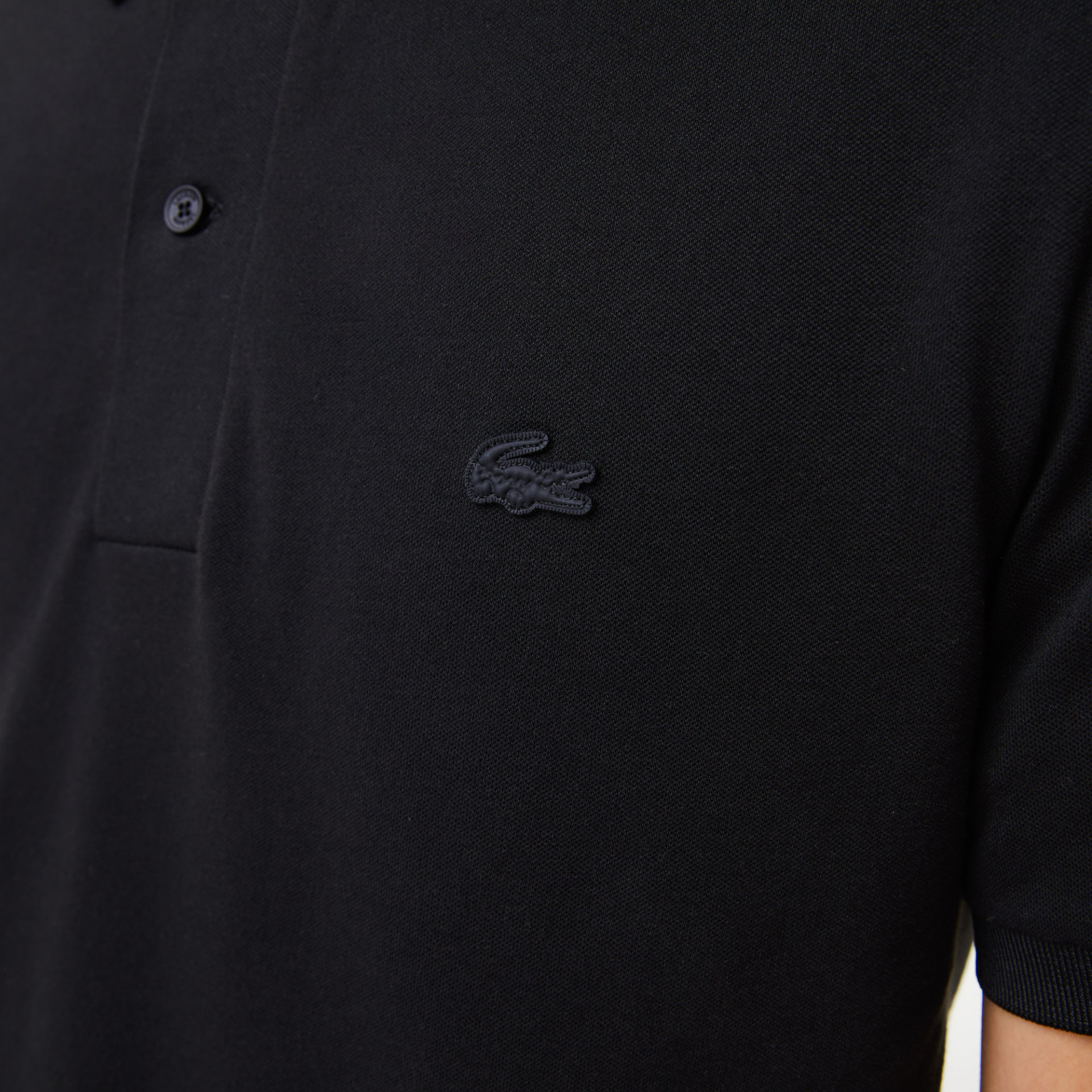 Polo homme slim fit en piqué stretch avec marquage Lacoste