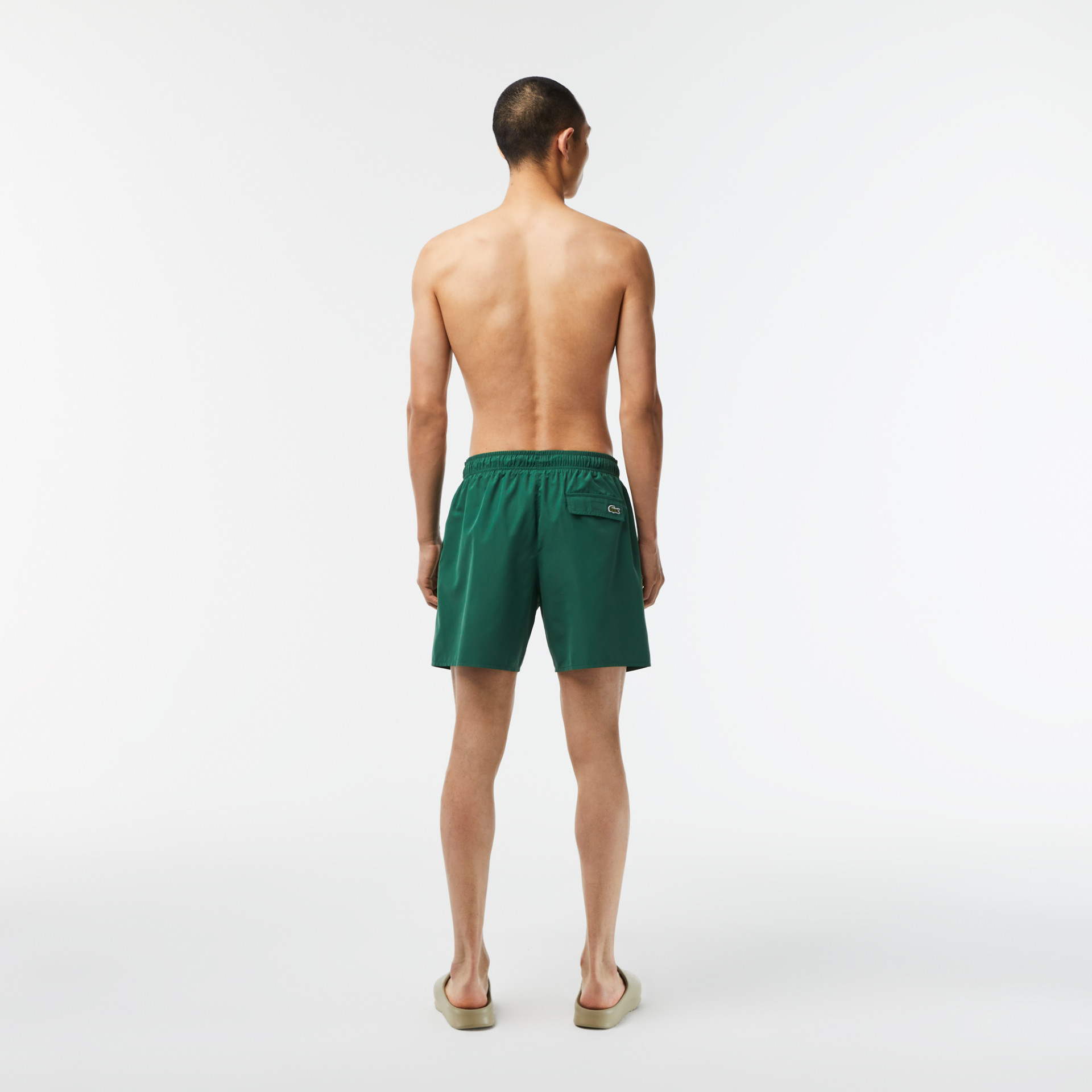 Short de bain homme Lacoste quick dry avec son sac de voyage