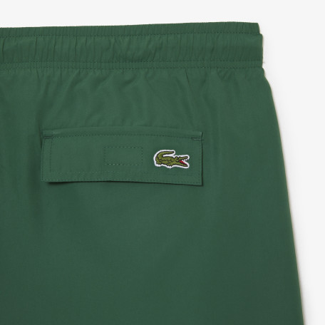 Short de bain homme Lacoste quick dry avec son sac de voyage