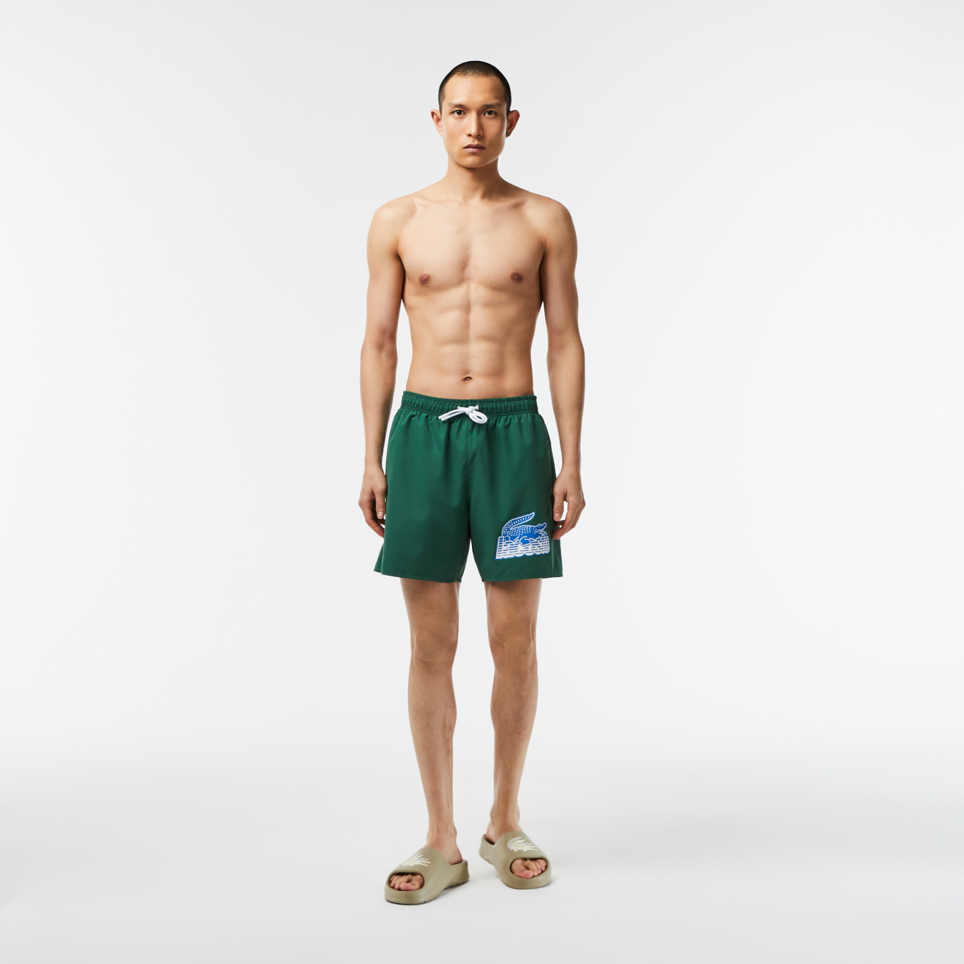 Short de bain homme Lacoste quick dry avec son sac de voyage