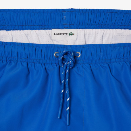 Short de bain long imprimé Lacoste